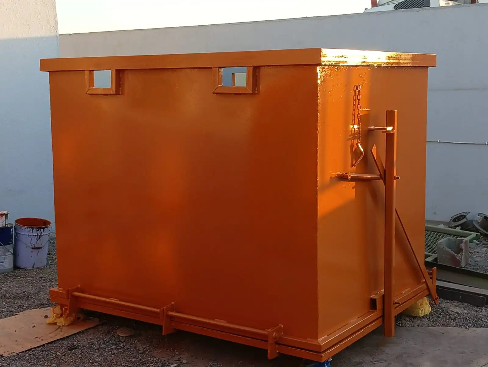 Heavy-duty drop bottom skip manufactured by Dar Al Fann in UAE