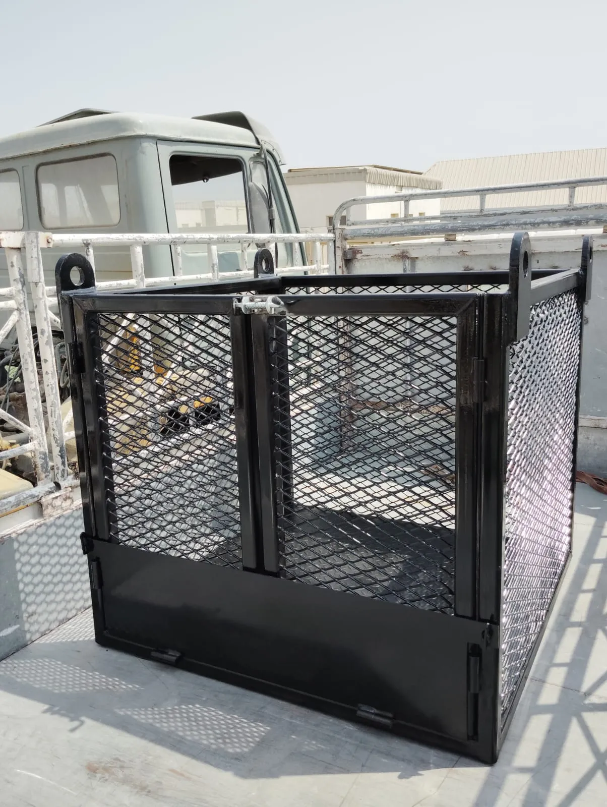 Material handling cage fabrication project by Dar Al Fann steel fabrication